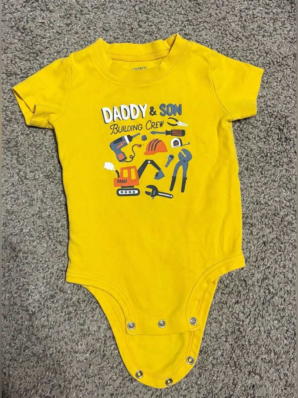 Carter’s yellow onesie
